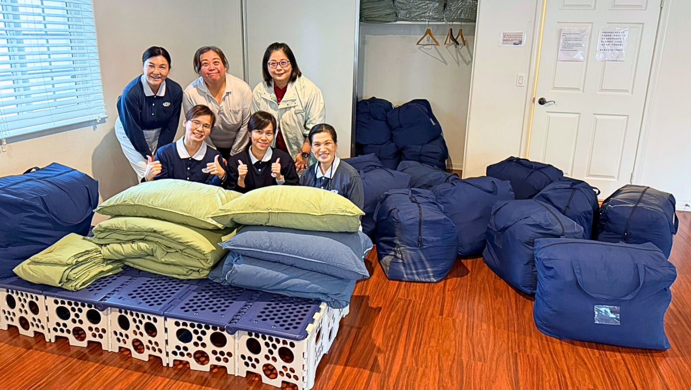 The Southern California Inland Volunteer Team tidies up the dormitories for the upcoming campers. (Photo/)
