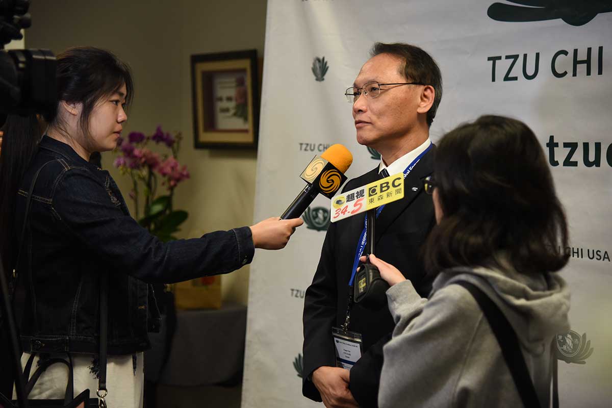 顏博文執行長 is interviewed by the media. | Image by: Dennis Lee 李侑達