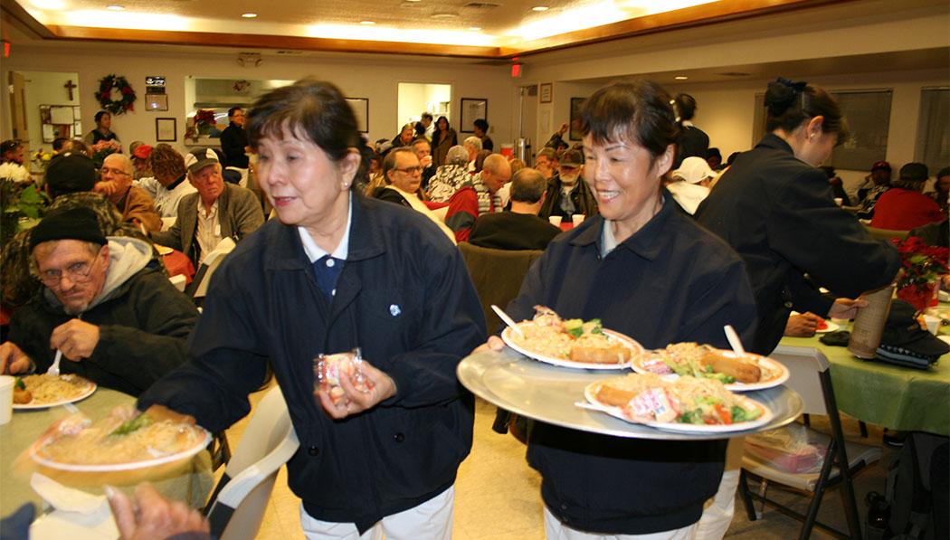 Tzu Chi volunteers serving delicious foods