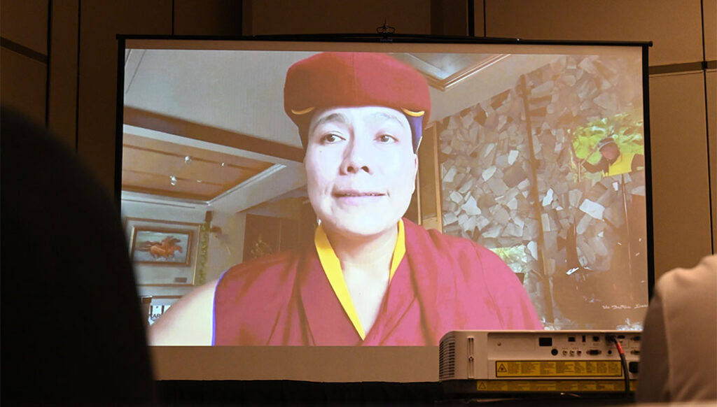 Lopön Jigme Tingdzin joins the discussion via video message from Nepal.