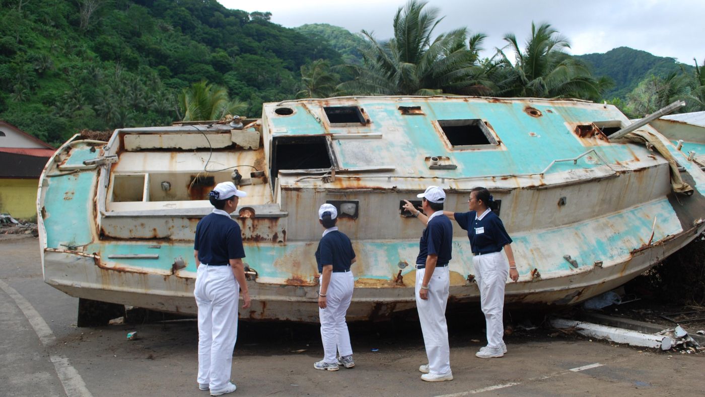 Tzu Chi volunteers assess damages following the 8.1-magnitude earthquake off the coast of American Samoa in 2009