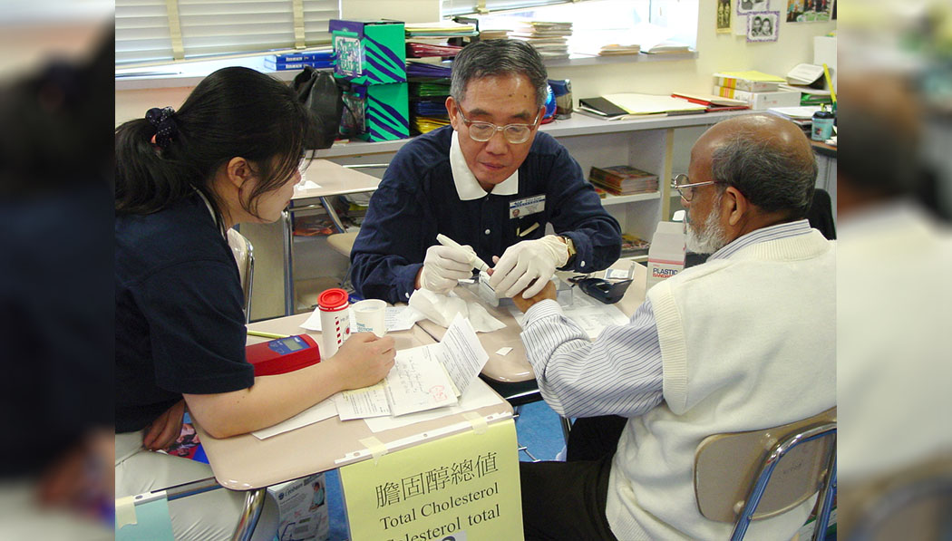 Volunteers test patients’ cholesterol