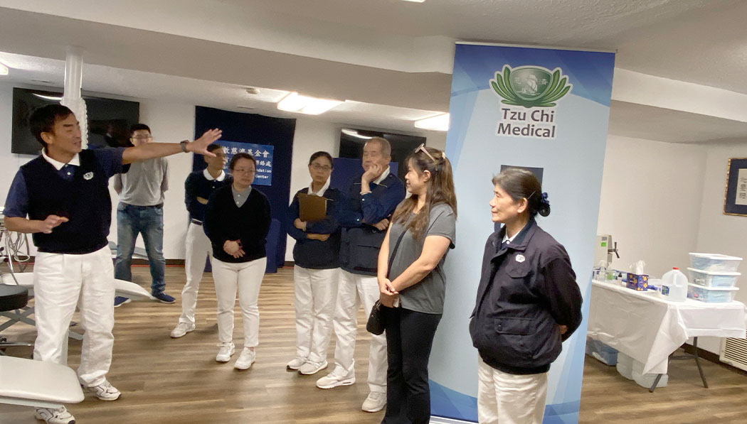 Tzu Chi Mid-Atlantic Region’s medical team leader, Shihchuan Fen (left) and other volunteers