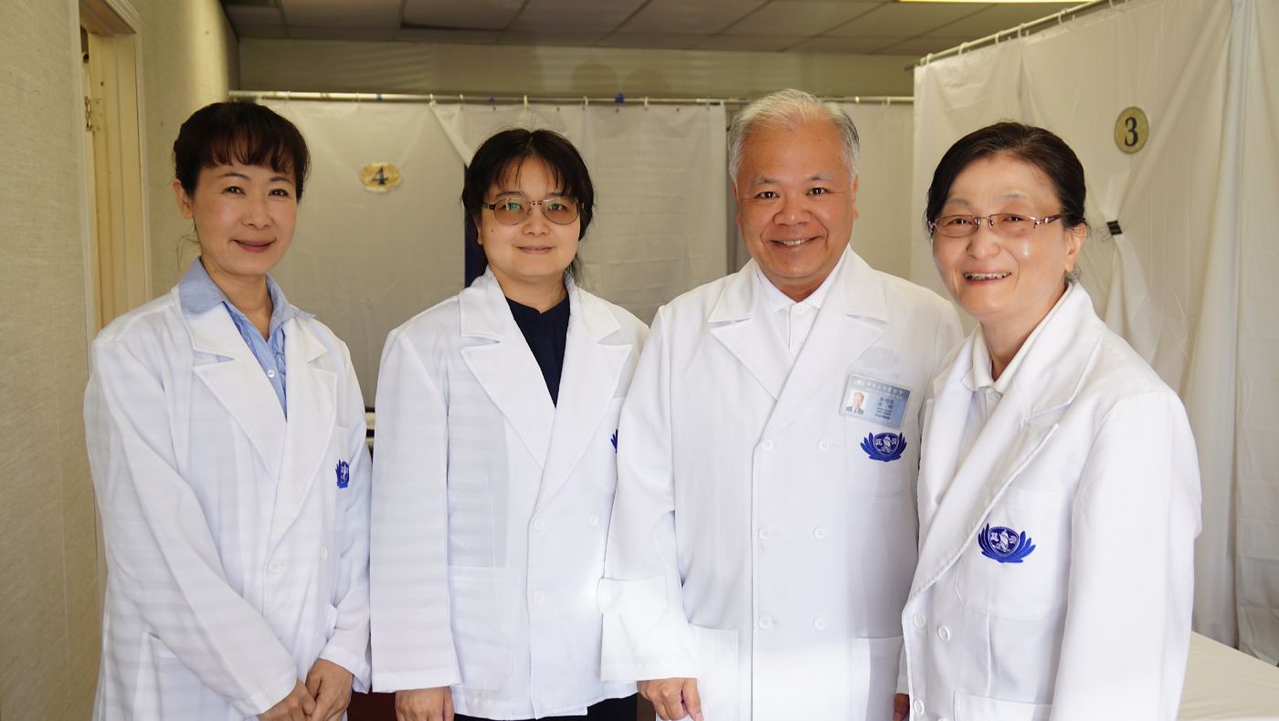 In 2018, Mike Liaw (second from right) took a group photo with the Chinese medicine team after a community free clinic.