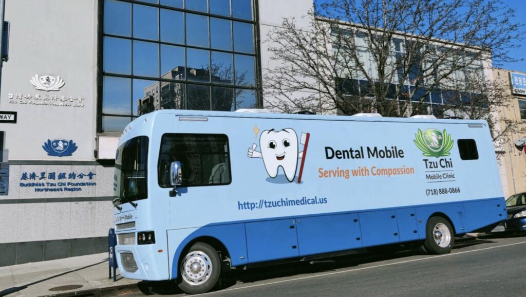 The 12th mobile clinic in the U.S. fleet arrives at the Tzu Chi USA Northeast Region Office on November 29, 2023. The new Dental Mobile Clinic will soon begin operating and offering dental care outreach. Photo/Courtesy of Tzu Chi USA Northeast Region