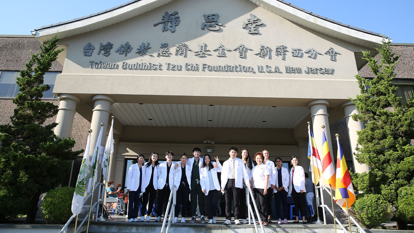 TIMA New Jersey, medical students and future doctors standing in front of Tzu Chi Mid-Atlantic office building