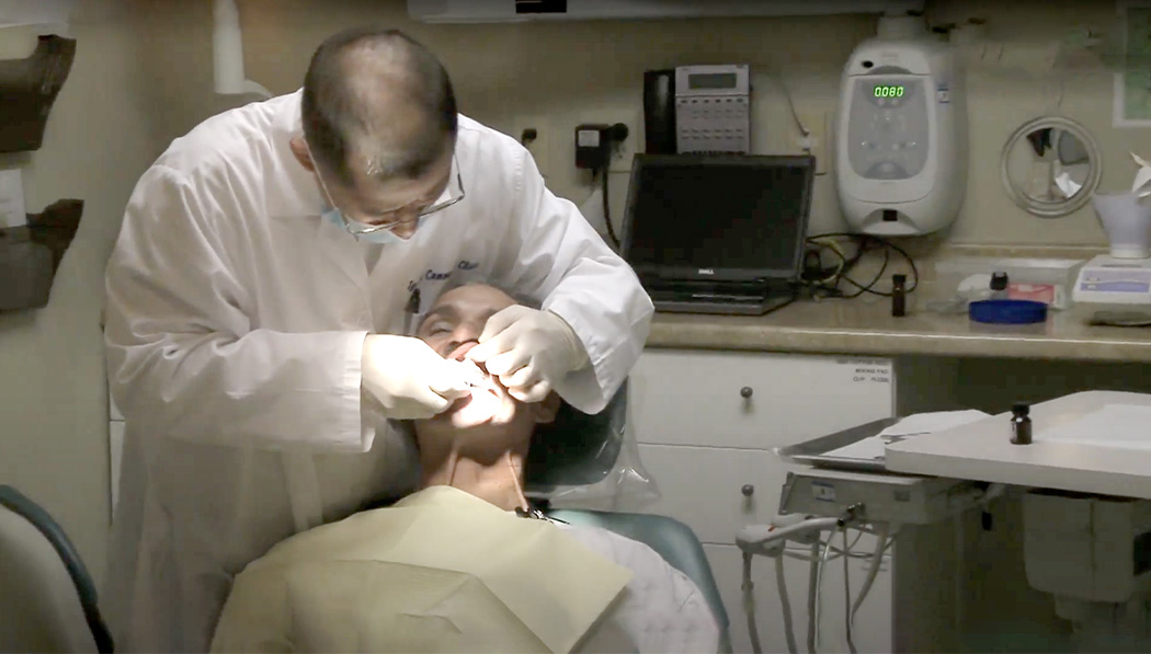 Dr. Peter C. Chen, a Tzu Chi dentist in South El Monte, aids people experiencing homelessness by providing services crucial to health and wellbeing, like obtaining dentures. Photo/US Tzu Chi 360 Video Screenshot