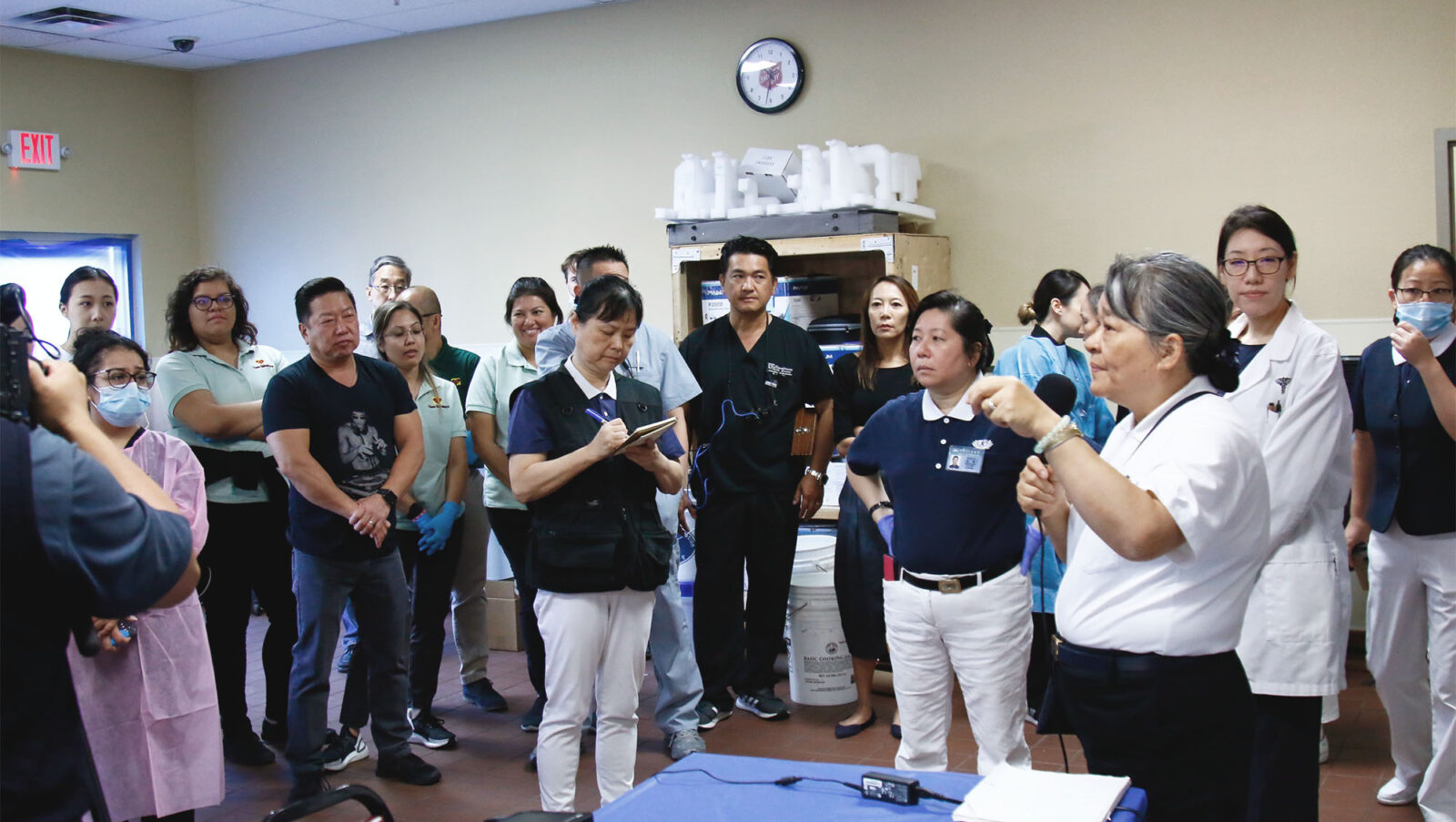 Audrey (recorder, center left) reports on the current situation of Tzu Chi Dental Clinic in Las Vegas at the Salvation Army Activity Center