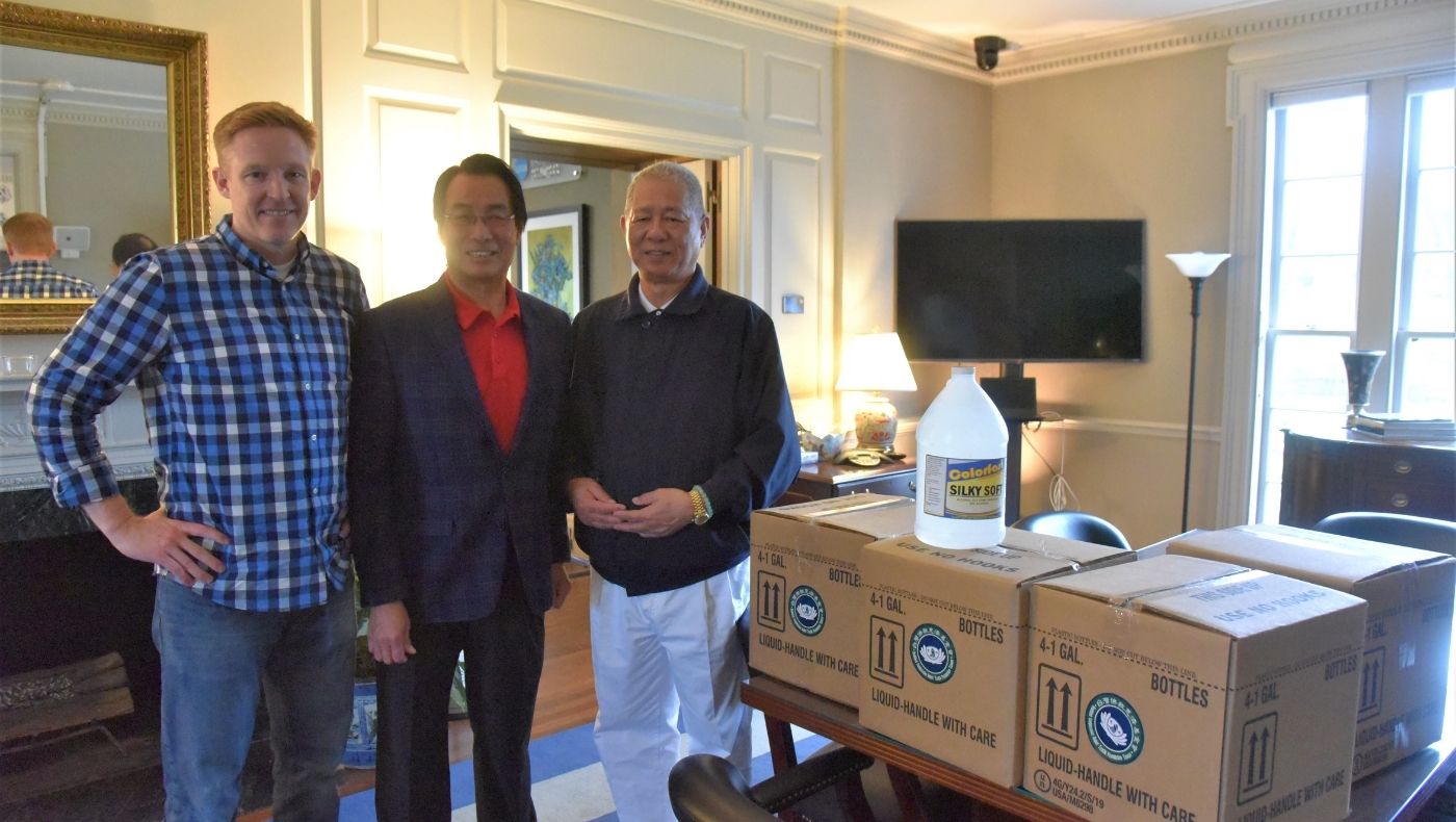 Jianyuan Zhou (center), mayor of Addison, TX, received a large amount of hand sanitizer donated by the Dallas branch at the beginning of 2020 when supplies were scarce.