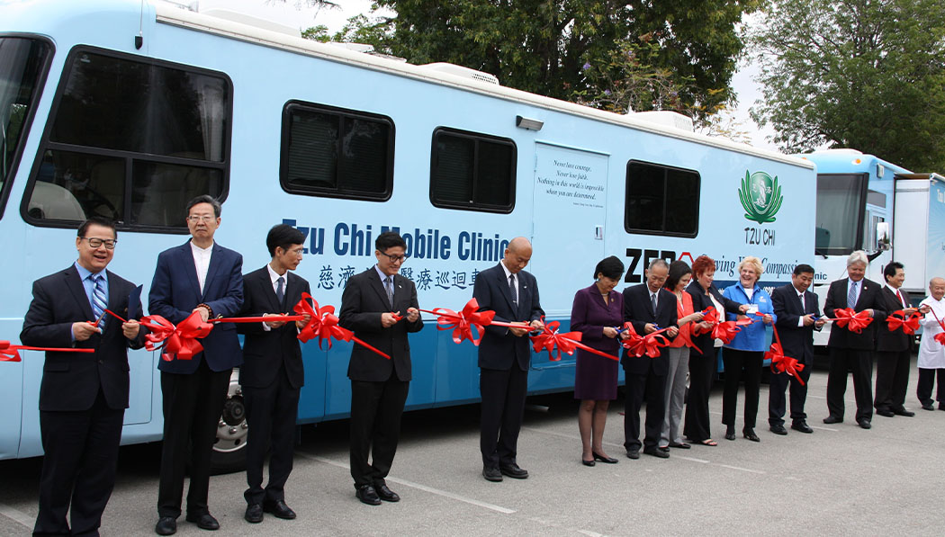 A ribbon-cutting ceremony is held to activate the Mobile Clinic donated by ZERO Prostate Cancer to Tzu Chi in 2016