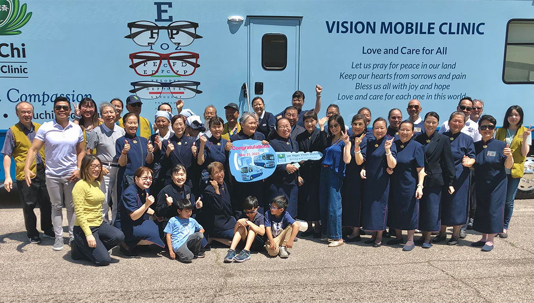 Volunteers group photo in front of 11th Mobile Clinic is put to use in Las Vegas