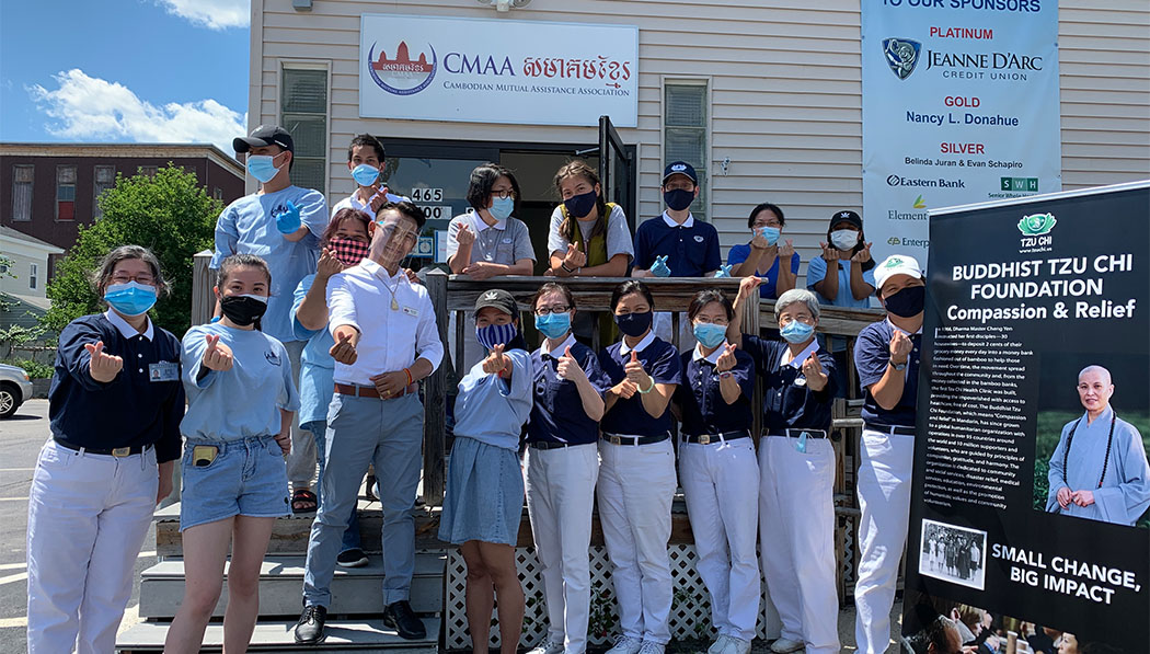 Boston Service Center volunteers and the Cambodian Mutual Assistance Association of Greater Lowell join forces to distribute food in Lowell, Massachusetts, on July 18, 2020.