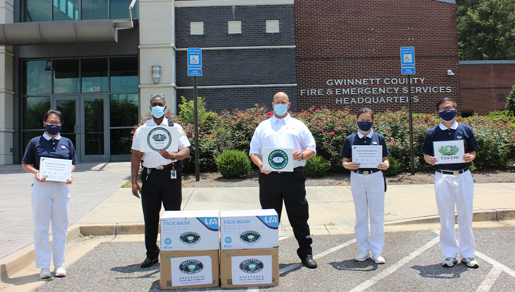 Tzu Chi Atlanta volunteers bring PPE donations to Gwinnett County Fire and Emergency Services Department as well as police departments in Georgia.