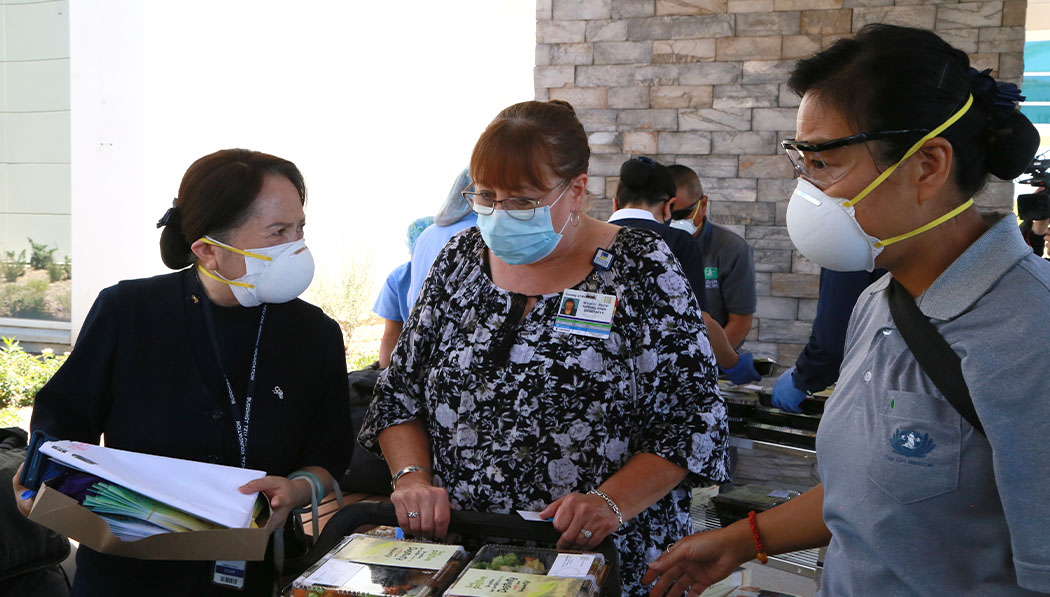 The lunch boxes are a welcome and curious sight for Riverside University Health System staff.