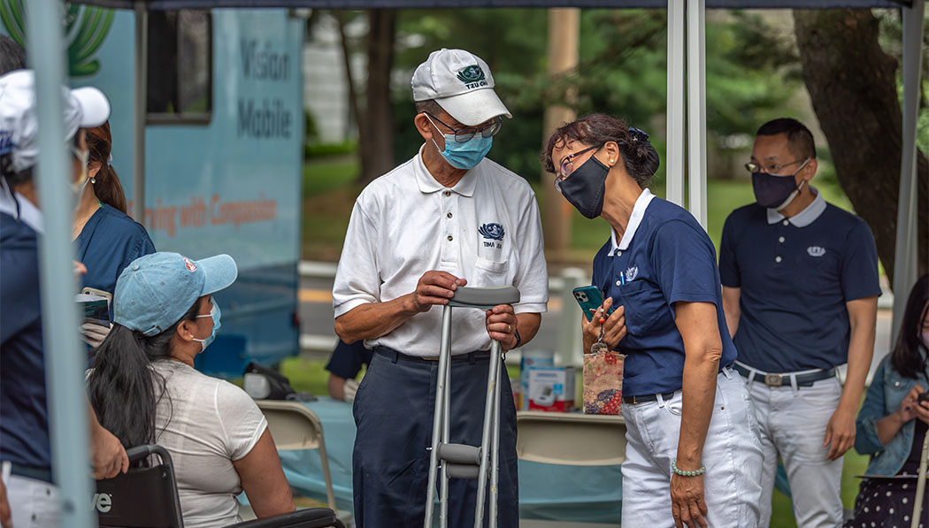 Despite the challenges and risks posed to them, staff and volunteers feel the rewards of being able to provide patient-centered care to those in need. Photo/Huaihsien Huang
