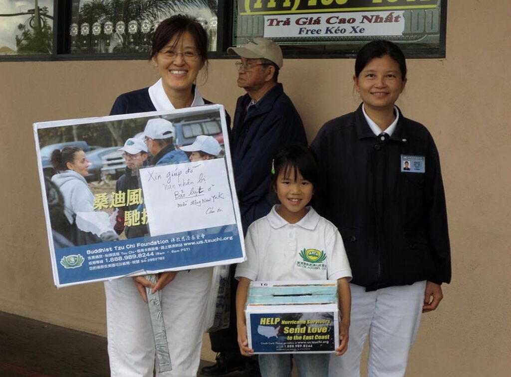 Eight-year-old Melinda Wu joins volunteers and takes to the streets to collect donations