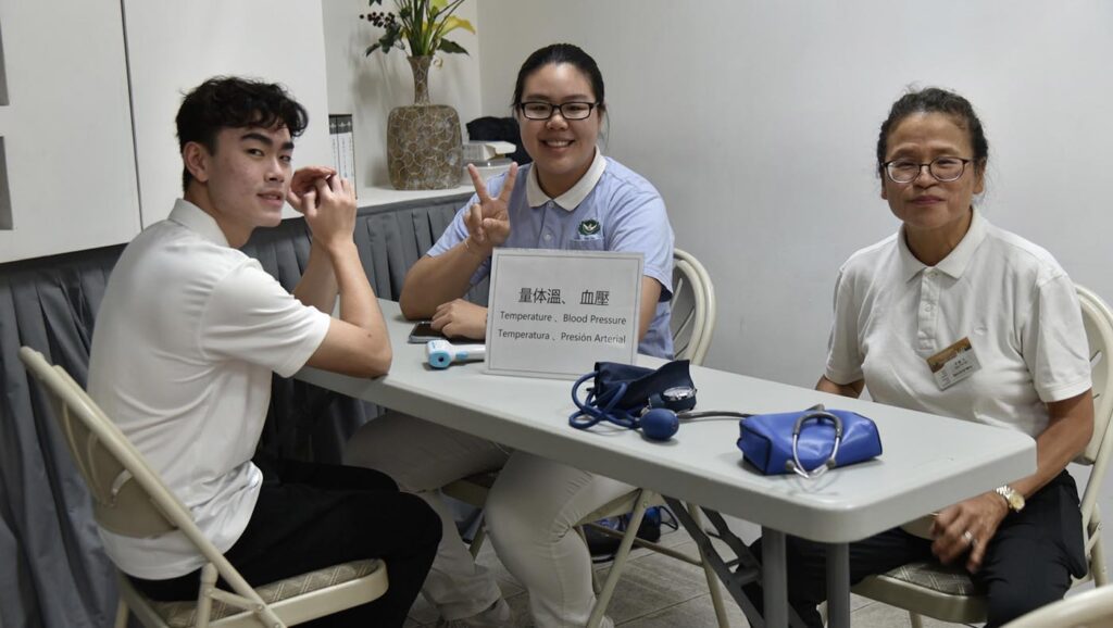 Chloe Chen and 2 other volunteers