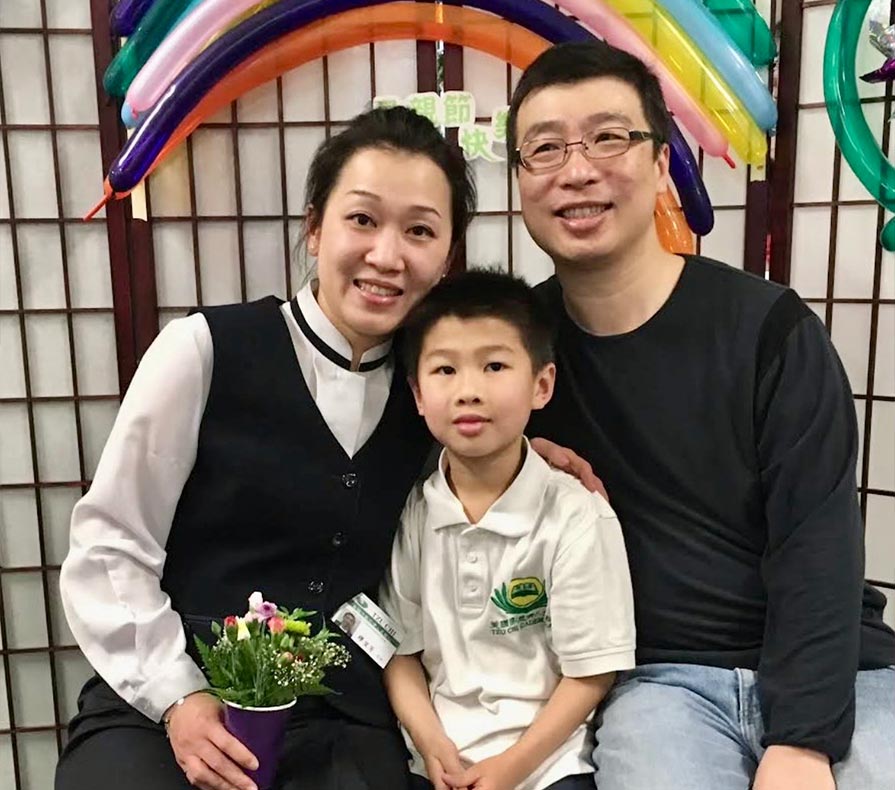 IFang Miao with her husband and son