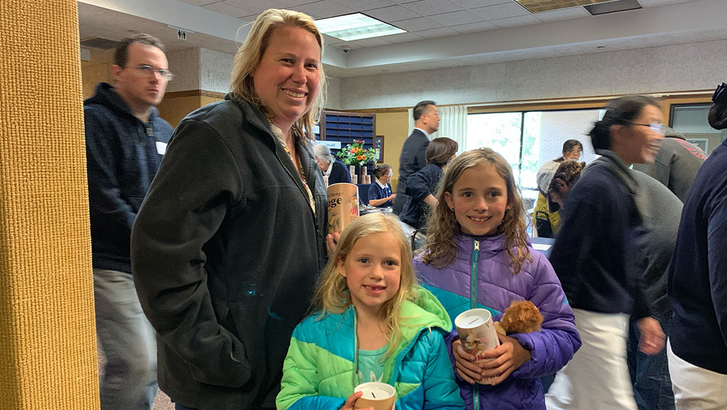 On May 19, 2019, Camp Fire survivors are invited to participate in a Buddha Day Ceremony where some families return filled bamboo banks. This photo was taken at the Tzu Chi Chico Recovery Center. Photo/Tzu Chi USA Northwest Region