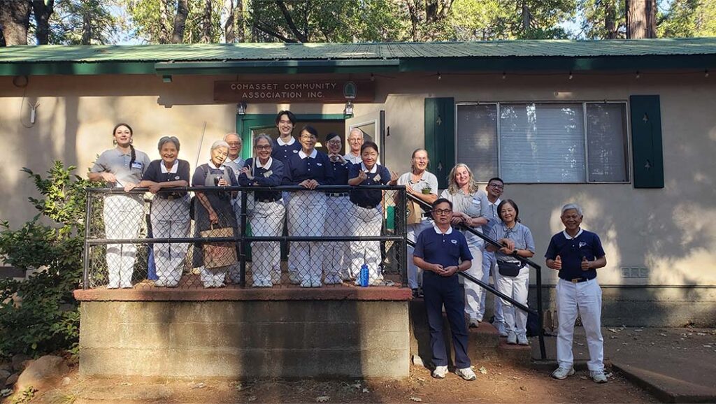 The Tzu Chi USA Northwest Region team poses for a group photo during the volunteer orientation held at the Cohasset Community Association's building