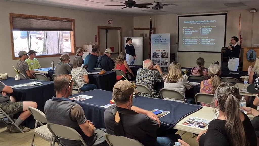 A Tzu Chi volunteer introduces the objectives of the Connection and Coalition for Recovery volunteer orientation event