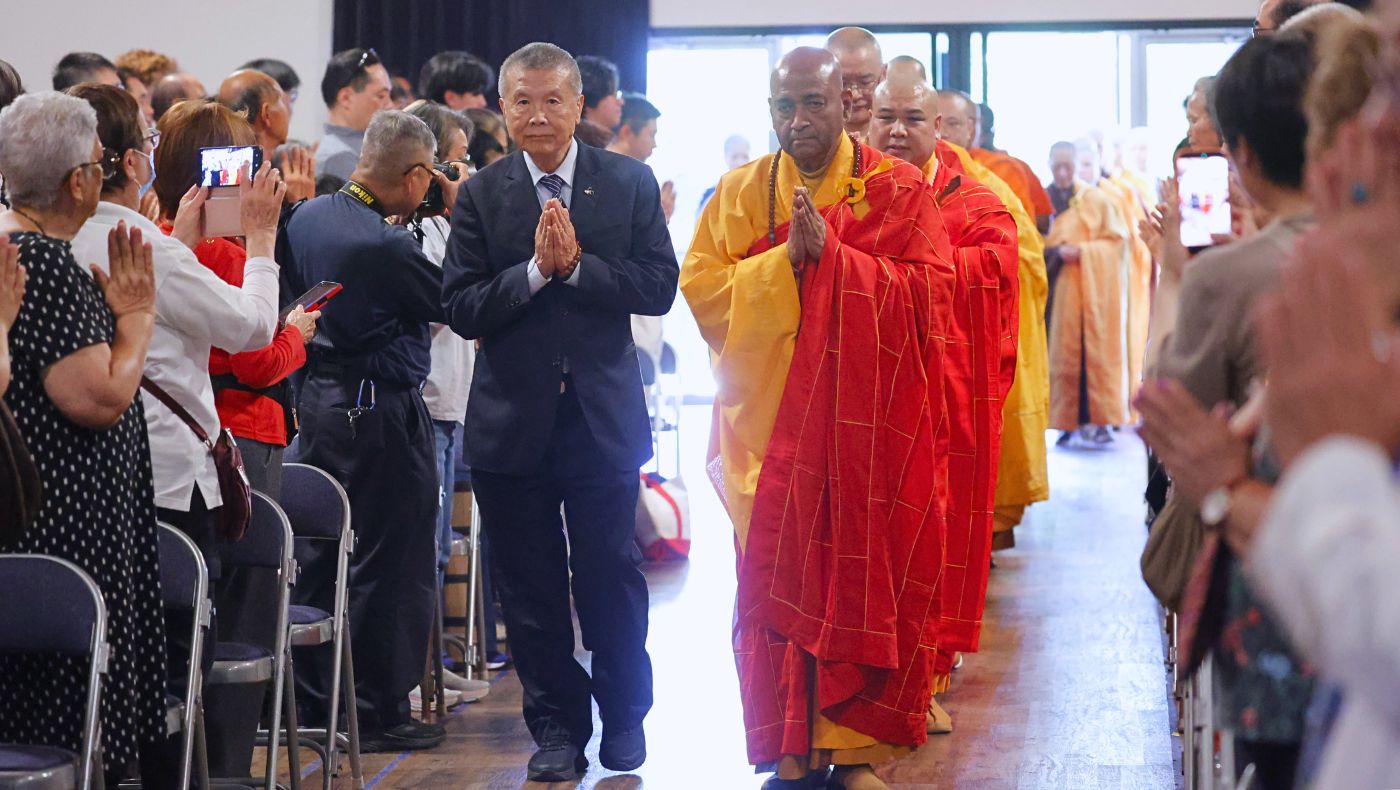 Volunteers, faith leaders, and community members alike move mindfully through the space toward altars adorned with orchids as close-held prayers fill the Tzu Chi USA National Headquarters campus in San Dimas, California. Photo/Shuli Lo