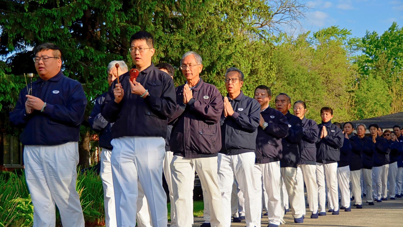 During this year’s Buddha Day, Mother's Day, and Tzu Chi Day celebrations, Tzu Chi members unite for a peaceful walking meditation in Darien, Illinois. Photo/James Chen