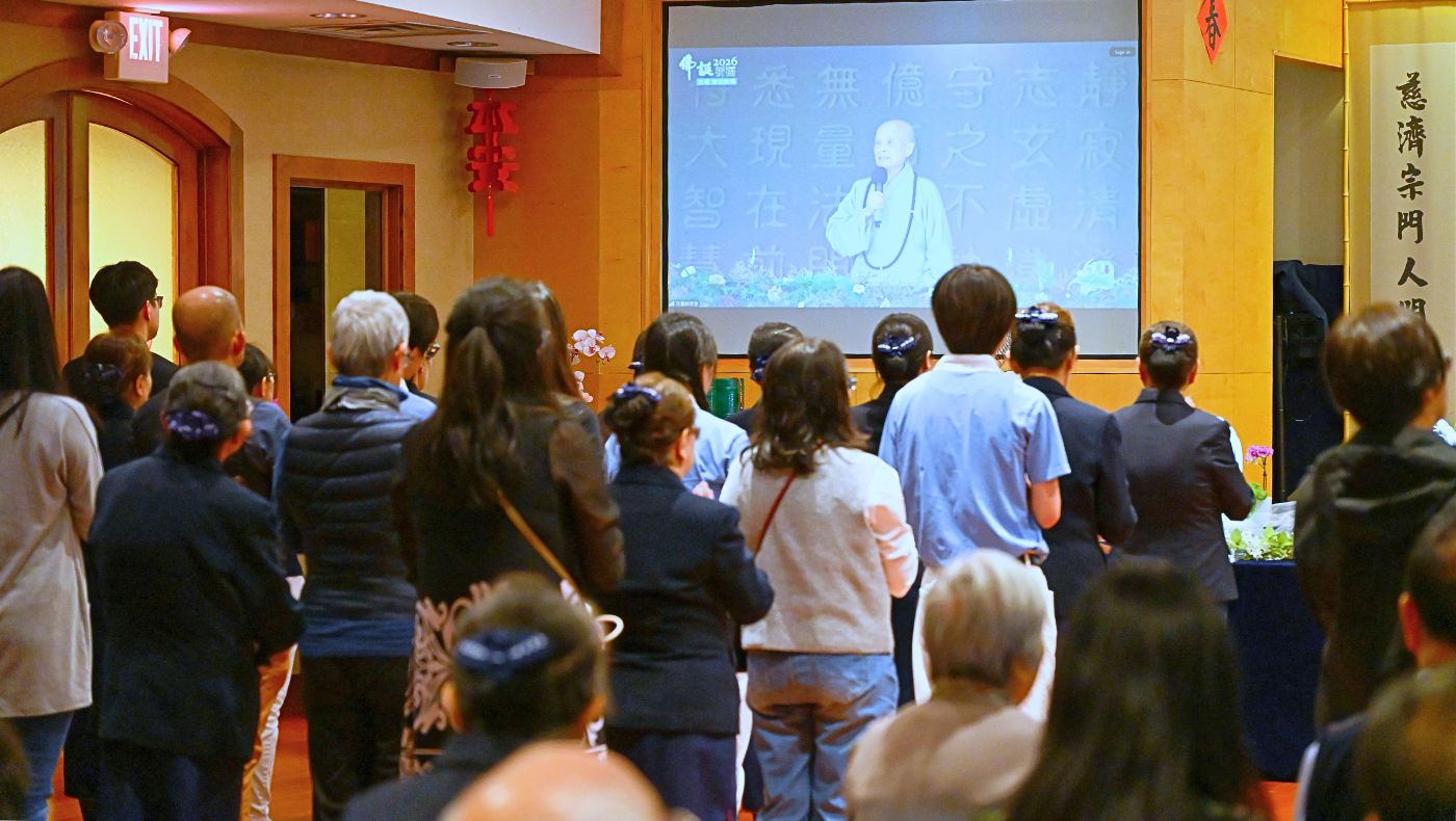 Local families and volunteers move together as prayers from Hualien, Taiwan, connect with Darien, Illinois. Photo/Dennis Lee